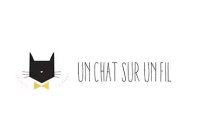 Un chat sur un fil